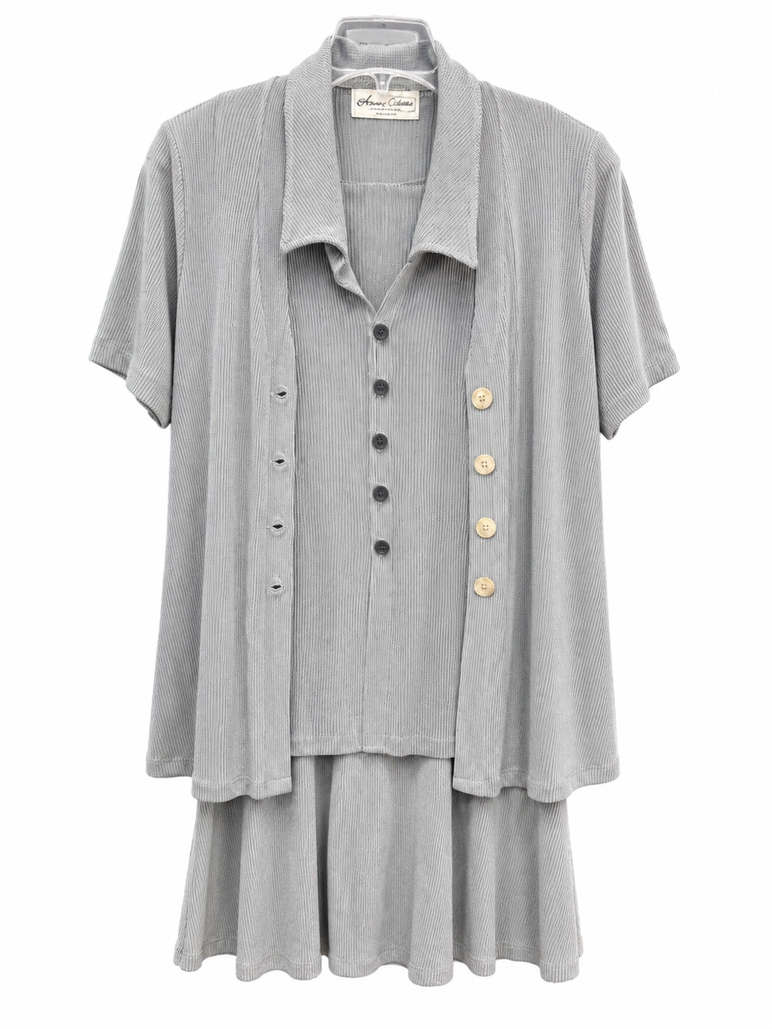 Casaco, blusa e saia
